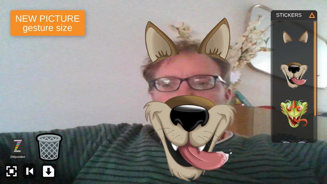 Zapp: Photobooth: take webcamPicture: Pic().gesture()wolf/dragon/bird (v3) ENall | ZIM JavaScript Canvas Framework - Code Creativity